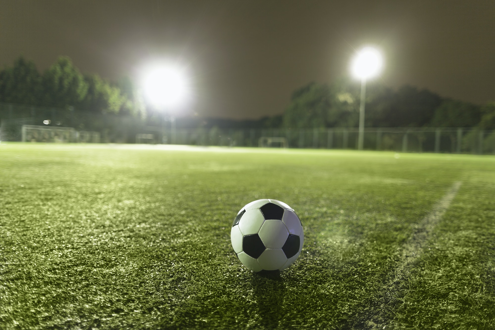 Soccer ball on sports field